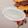 Bandeja de porcelana blanca portuguesa con relieve de pavo - Cositas Antiguas – La Guadaña, Anticuarios Online en Jerez , vender antigüedades, muebles antiguos