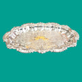 Bandeja de metal plateado con ornamentos - Cositas Antiguas – La Guadaña, Anticuarios Online en Jerez , vender antigüedades, muebles antiguos