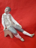 Figura Lladró de porcelana | hombre sentado en banco - Cositas Antiguas – La Guadaña, Anticuarios Online en Jerez , vender antigüedades, muebles antiguos