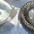 Plato hondo de metal plateado con relieve - Cositas Antiguas – La Guadaña, Anticuarios Online en Jerez , vender antigüedades, muebles antiguos