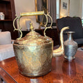 Tetera antigua de metal repujado y asa de latón - Cositas Antiguas – La Guadaña, Anticuarios Online en Jerez , vender antigüedades, muebles antiguos