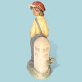 Figura Lladró Niño Viajero porcelana antigua descatalogada - Cositas Antiguas – La Guadaña, Anticuarios Online en Jerez , vender antigüedades, muebles antiguos