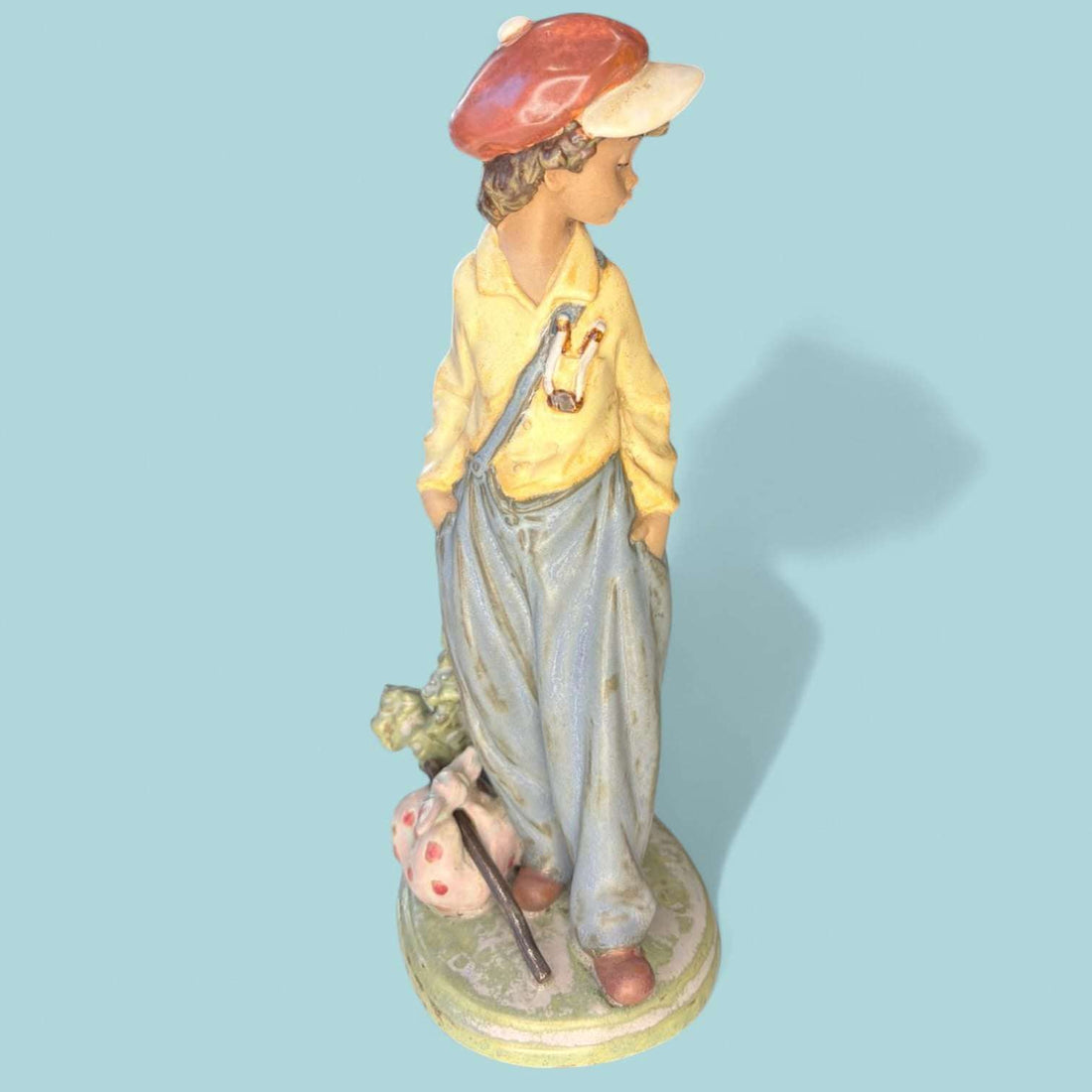 Figura Lladró Niño Viajero porcelana antigua descatalogada - Cositas Antiguas – La Guadaña, Anticuarios Online en Jerez , vender antigüedades, muebles antiguos