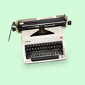 Máquina de escribir Olympia portátil vintage - Cositas Antiguas – La Guadaña, Anticuarios Online en Jerez , vender antigüedades, muebles antiguos