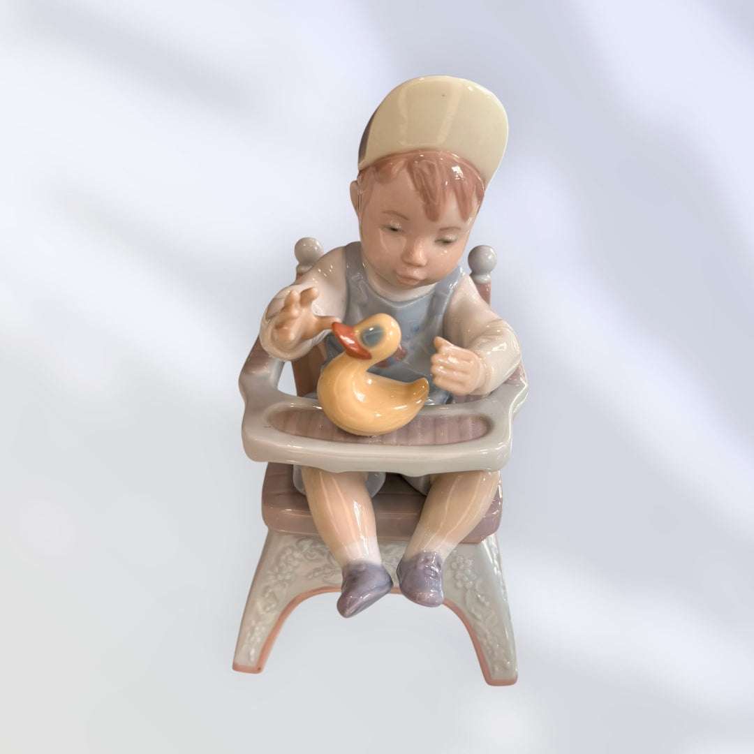 Bebés Lladró en tronas con patito y osito de porcelana - Cositas Antiguas – La Guadaña, Anticuarios Online en Jerez , vender antigüedades, muebles antiguos