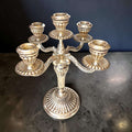 Pareja de candelabros de metal plateado de cinco luces - Cositas Antiguas – La Guadaña, Anticuarios Online en Jerez , vender antigüedades, muebles antiguos