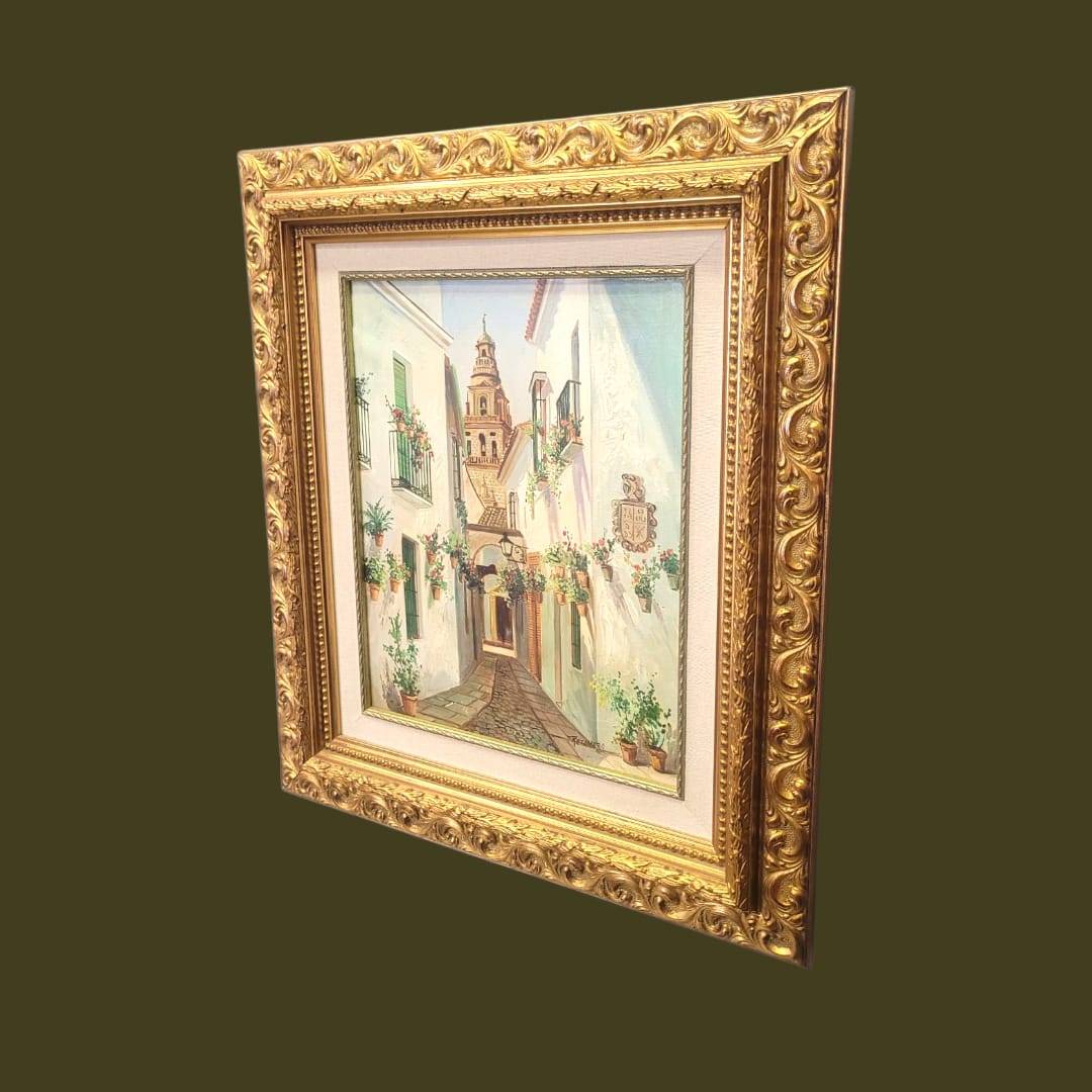 Cuadro al óleo Retamero – Calle típica andaluza con flores - Cositas Antiguas – La Guadaña, Anticuarios Online en Jerez , vender antigüedades, muebles antiguos