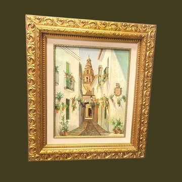 Cuadro al óleo Retamero – Calle típica andaluza con flores - Cositas Antiguas – La Guadaña, Anticuarios Online en Jerez , vender antigüedades, muebles antiguos