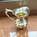 Jarra de metal plateado | Elegancia única en tu mesa - Cositas Antiguas – La Guadaña, Anticuarios Online en Jerez , vender antigüedades, muebles antiguos