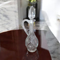 Jarra licorera de cristal tallada con asa elegante - Cositas Antiguas – La Guadaña, Anticuarios Online en Jerez , vender antigüedades, muebles antiguos