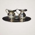 Pareja de jarritas vintage de metal plateado con bandeja - Cositas Antiguas – La Guadaña, Anticuarios Online en Jerez , vender antigüedades, muebles antiguos