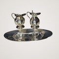Pareja de jarritas vintage de metal plateado con bandeja - Cositas Antiguas – La Guadaña, Anticuarios Online en Jerez , vender antigüedades, muebles antiguos