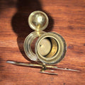 Tarro de metal dorado con forma de molino de viento - Cositas Antiguas – La Guadaña, Anticuarios Online en Jerez , vender antigüedades, muebles antiguos