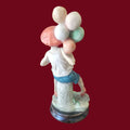 Figura niño con globos estilo Capodimonte sobre peana - Cositas Antiguas – La Guadaña, Anticuarios Online en Jerez , vender antigüedades, muebles antiguos