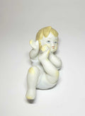 Niño en porcelana de Biscuit – Elegancia y detalle - Cositas Antiguas – La Guadaña, Anticuarios Online en Jerez , vender antigüedades, muebles antiguos