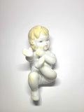 Niño en porcelana de Biscuit – Elegancia y detalle - Cositas Antiguas – La Guadaña, Anticuarios Online en Jerez , vender antigüedades, muebles antiguos