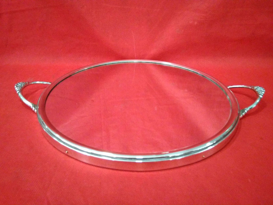 Bandeja redondeada de metal plateado espejada – Diseño elegante - Cositas Antiguas – La Guadaña, Anticuarios Online en Jerez , vender antigüedades, muebles antiguos