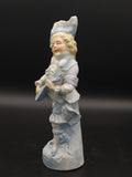 Figura de porcelana antigua de galleta, niño tocando cuerda - Cositas Antiguas – La Guadaña, Anticuarios Online en Jerez , vender antigüedades, muebles antiguos