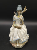 Figura de porcelana Casades | Mujer con Flores - Cositas Antiguas – La Guadaña, Anticuarios Online en Jerez , vender antigüedades, muebles antiguos