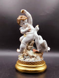 Figura de Ángel con Pato - Elegancia y Decoración Exclusiva - Cositas Antiguas – La Guadaña, Anticuarios Online en Jerez , vender antigüedades, muebles antiguos