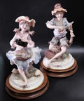 Figuras de porcelana fina marca Carlos | Niño y Niña - Cositas Antiguas – La Guadaña, Anticuarios Online en Jerez , vender antigüedades, muebles antiguos