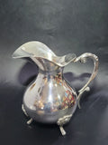 Jarra de metal plateado con patas ornamentales - Cositas Antiguas – La Guadaña, Anticuarios Online en Jerez , vender antigüedades, muebles antiguos